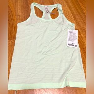 Never worn Lulu lemon swiftly tank size 6